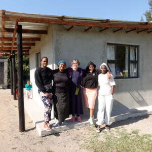 The Dream Team: Veronica, Gogo Thandi, Pam, Pinky, Vuyo outside a new classroom built with funds raised by a Slovakian Ursuline school.